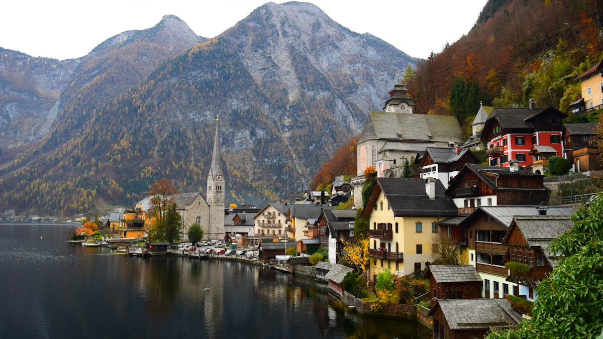 City buildings beside a calm stretch of water