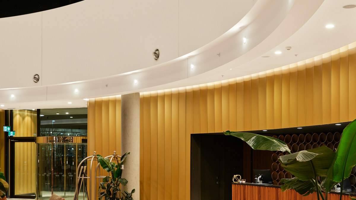 Chairs and a reception desk in a hotel lobby